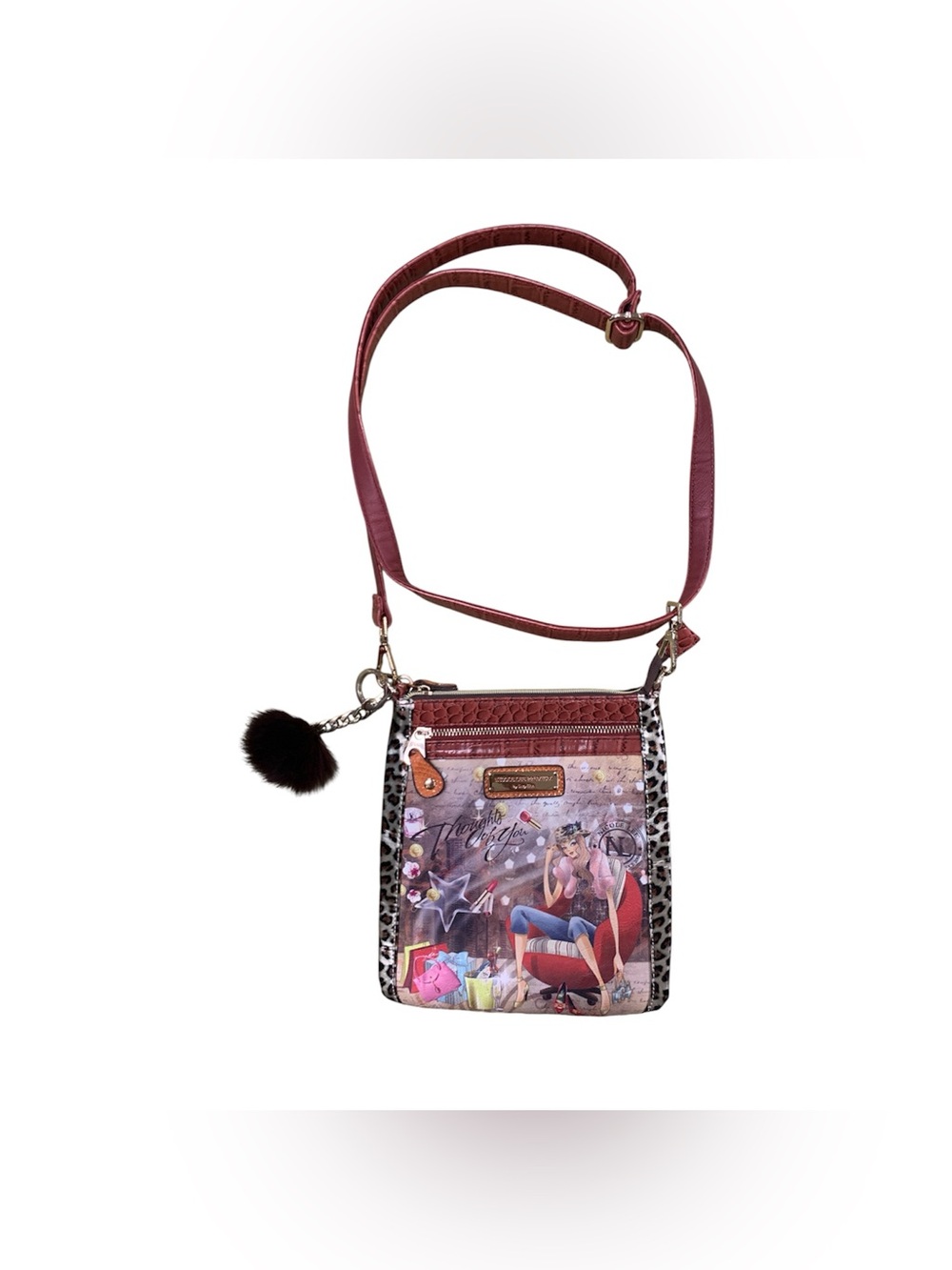 Nicole Lee NWT Burgundy Crossbody Bag with Graphic Panel and Pom Pom